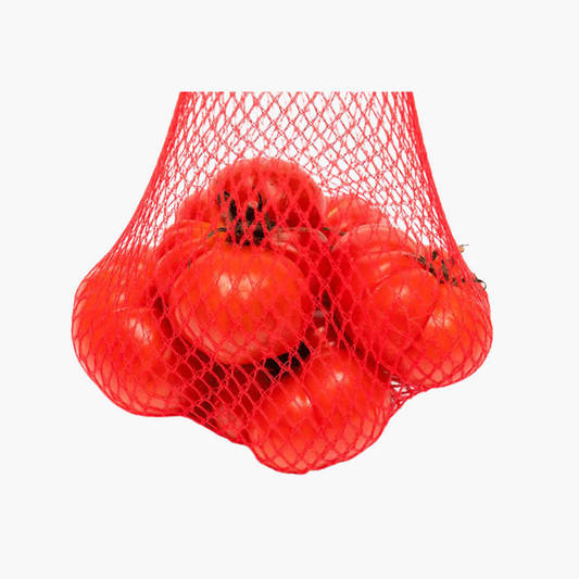 Filet rouge rempli de tomates fraîches pour emballage de fruits et légumes
